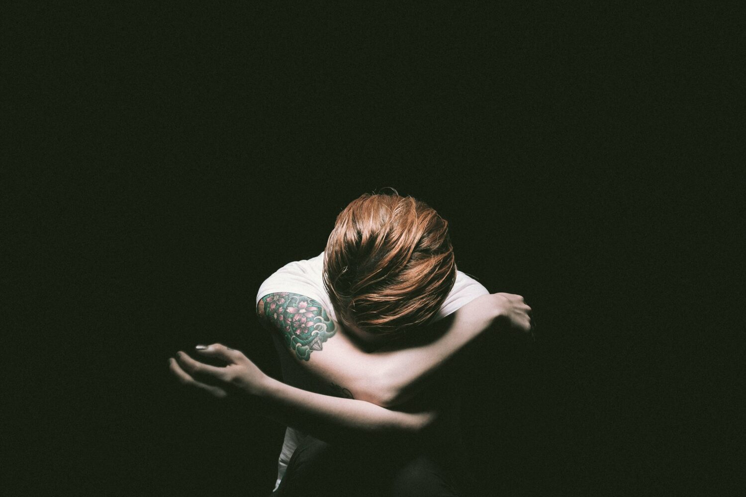 image representing suppressing emotions in article about adult children of alcoholics traits
