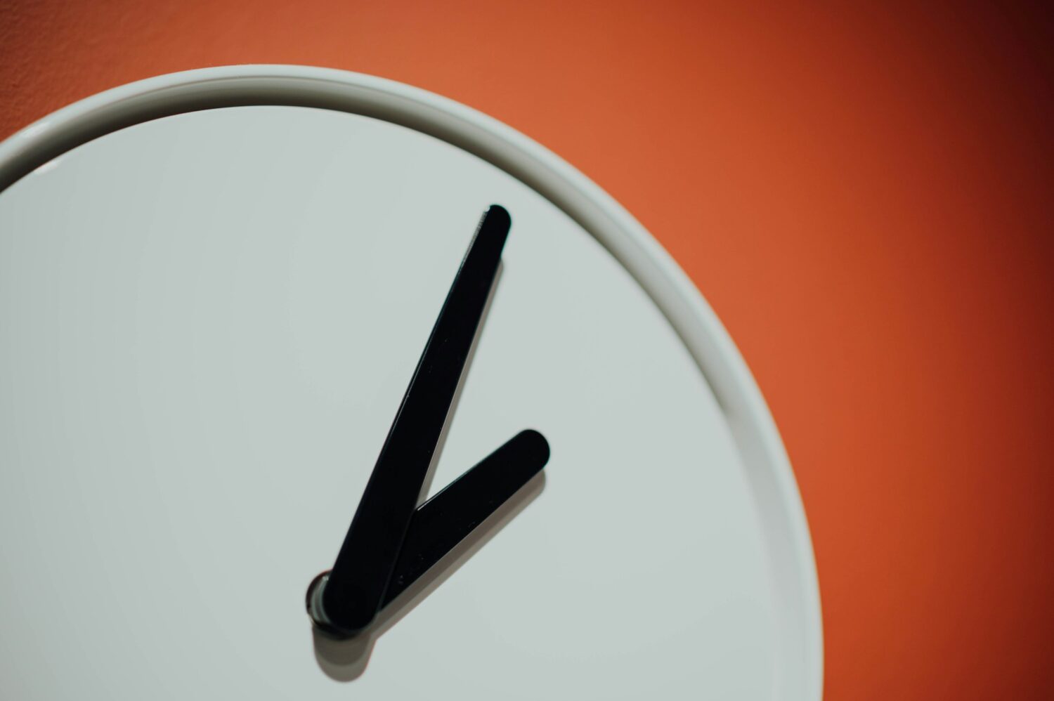 white and black wall clock, visualization of clock starting, to answer question of how long does it take for a parent to get custody back